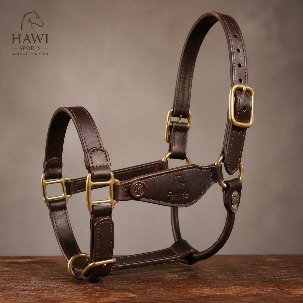 Brown Hawi Sports leather horse halter with adjustable gold-tone buckles and rings
