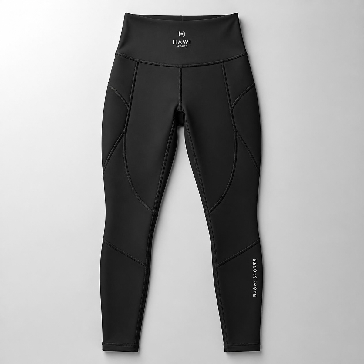 Hawi Sports Compression Leggings in black, high-waisted with contoured stitching and side logo