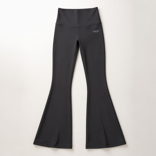 Hawi Sports Flare Leggings in black with a high-waisted fitted top that flares from the knee