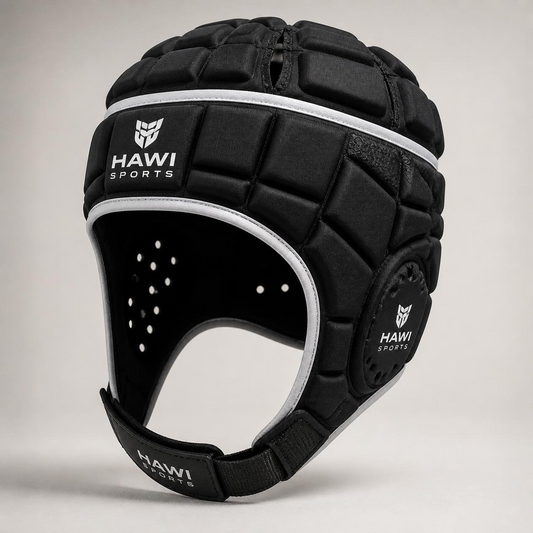 Black padded Hawi Sports rugby headgear with white trim and branded chin strap