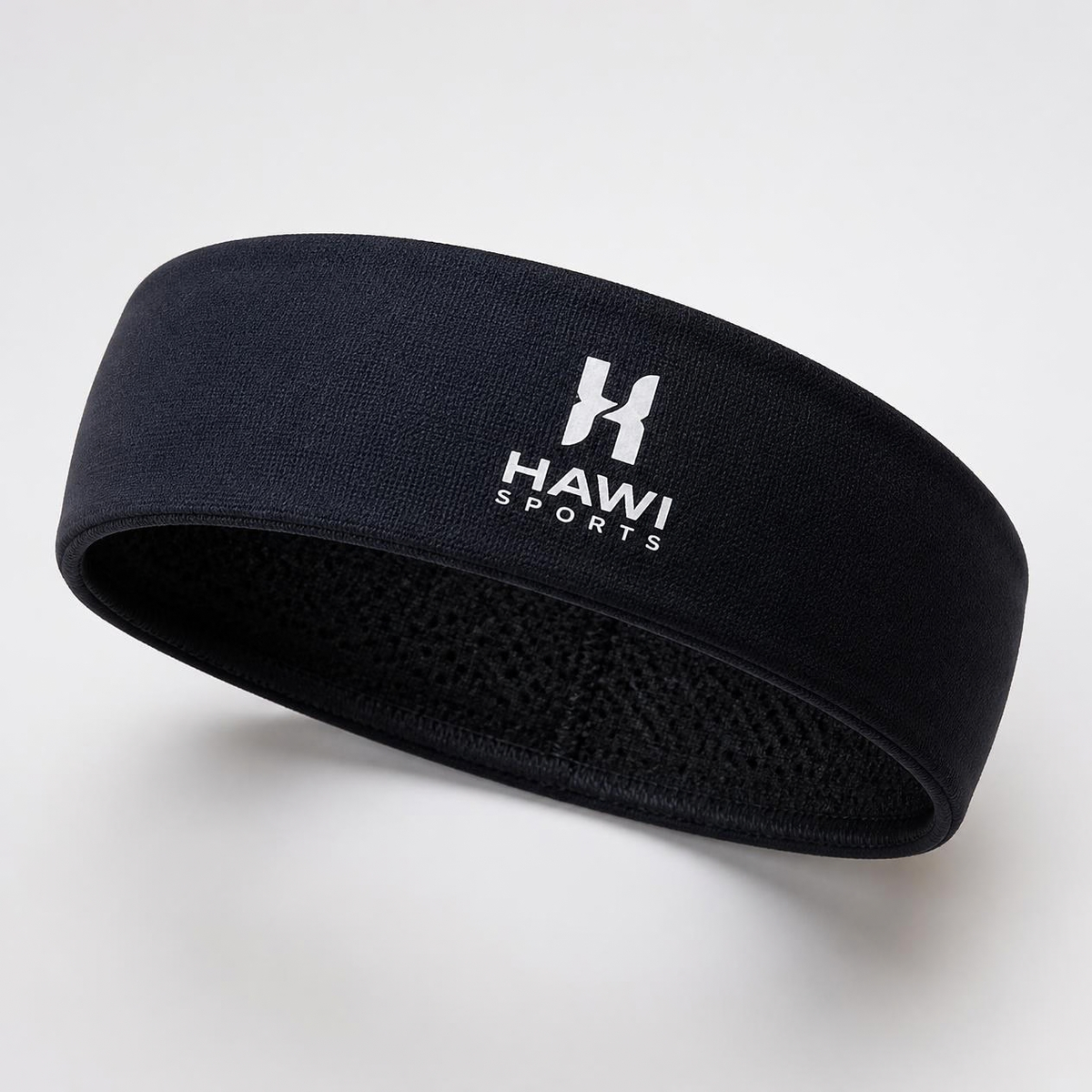 Black Hawi Sports volleyball headband with white brand logo on a light background