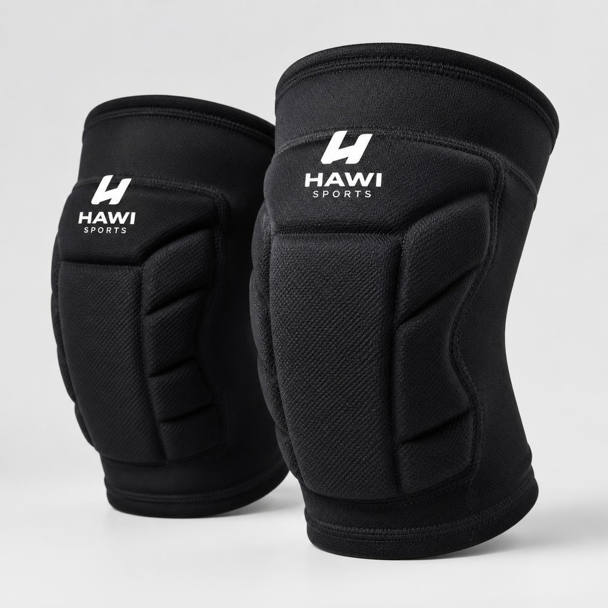 Pair of black padded Hawi Sports volleyball knee pads with white logos